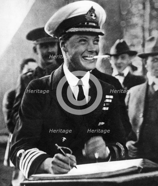 The Prince of Wales signing a visitors' book in Canada, c1920s. Artist: Unknown