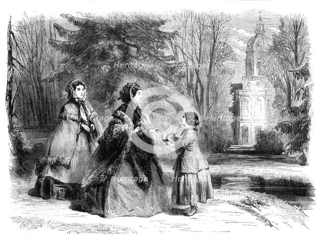 The Princess Frederick William of Prussia promenading in the garden of the palace at..., 1860. Creator: Unknown.