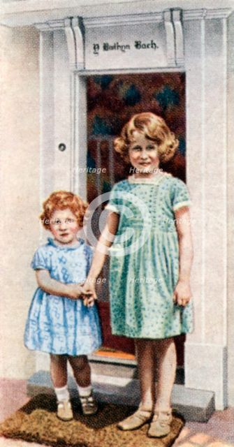 The Princesses Elizabeth and Margaret Rose at the door of the Little House, 1933, (c1935). Artist: Unknown
