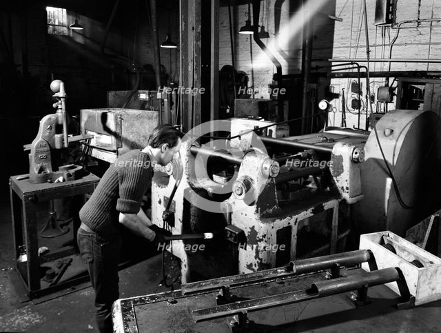 The process of forging heads at the Edgar Allen Steel Foundry, Sheffield, South Yorkshire, 1962. Artist: Michael Walters