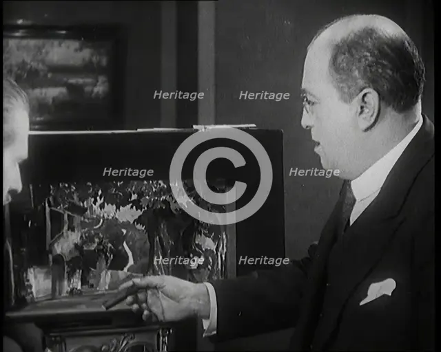 The Producer Julian Wylie Choosing Set a Design for a Theatre Show, 1920s. Creator: British Pathe Ltd.