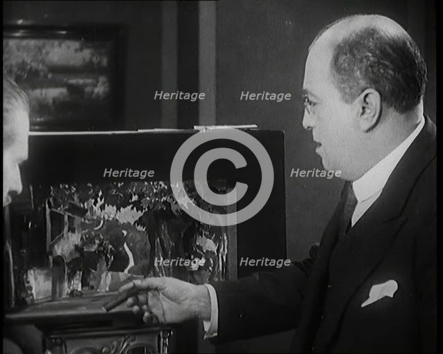 The Producer Julian Wylie Choosing Set a Design for a Theatre Show, 1920s. Creator: British Pathe Ltd.