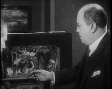 The Producer Julian Wylie Choosing Set a Design for a Theatre Show, 1920s. Creator: British Pathe Ltd