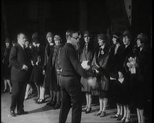 The Producer Julian Wylie Inspecting Young Prospective Female Stage Performers Standing..., 1920s. Creator: British Pathe Ltd