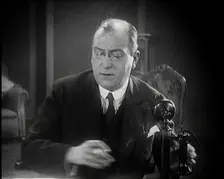 The Producer Julian Wylie Speaking on a Telephone, 1920s. Creator: British Pathe Ltd