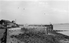 The quay outside the water gate of Tilbury Fort, Essex, c1945-c1965. Artist: SW Rawlings