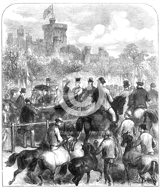 The Queen at the Agricultural Society's Show in the Home Park, Windsor: judging the horses, 1872. Creator: Unknown.