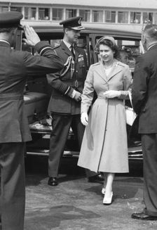 The Queen and Prince Philip arrive at London Airport to fly to Ulster, 1953. Creator: Unknown