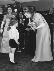 The Queen and Princess Anne attending a film performance, Odeon Theatre, Leicester Square, 1970. Creator: Unknown