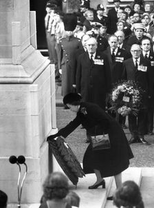 The Queen laying a wreath at the Cenotaph, Remembrance Day Parade, Whitehall, London, 1980. Creator: Unknown