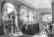 The Queen passing through the lobby of the new building of London University, 1870. Creator: Unknown