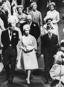 The Queen, Prince Philip, and Prince Charles attending the wedding of Princess Alexandra, 1963. Creator: Unknown