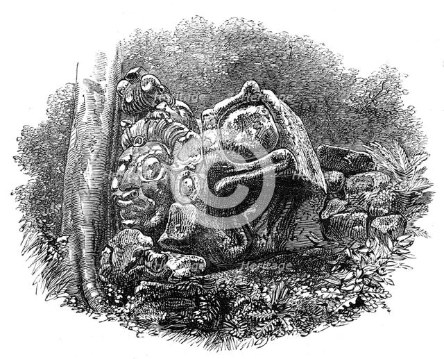 The Ruins of Copan, Central America: a head, with other sculptured stones, 1864. Creator: Unknown.
