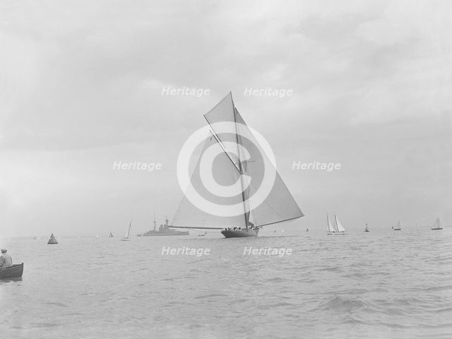 The racing cutter 'Terpisichore' running downwind, 1922. Creator: Kirk & Sons of Cowes.