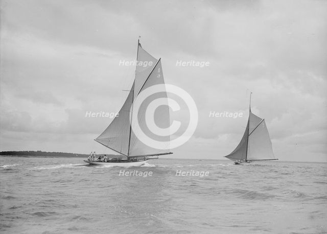 The racing cutters 'The Lady Anne' and 'Istria' running downwind, 1912. Creator: Kirk & Sons of Cowes.