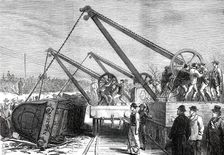 The Railway Accident at Abbotts Ripton, Huntingdon: raising an engine from the wrecked train, 1876. Creator: Unknown