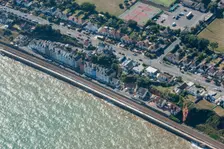 The railway line running along the edge of the sea, Dawlish, Devon, 2016. Creator: Damian Grady