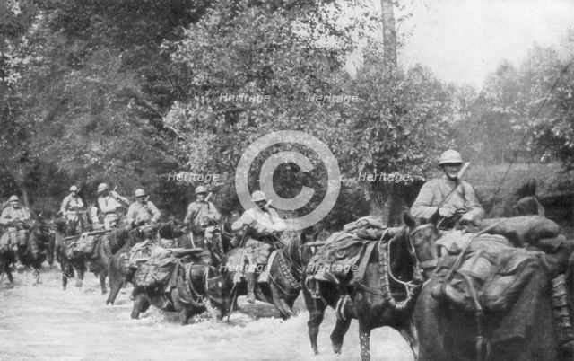 The re-supply of a machine gun unit by horseback, Aisne, France, 2 September 1918. Artist: Unknown