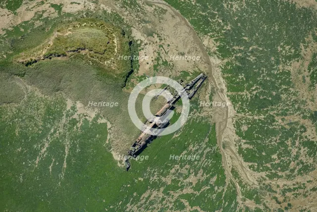 The remains of a surrendered First World War German submarine in Stoke Saltings, Medway, 2024. Creator: Damian Grady.