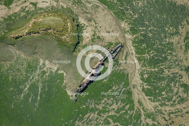 The remains of a surrendered First World War German submarine in Stoke Saltings, Medway, 2024. Creator: Damian Grady.