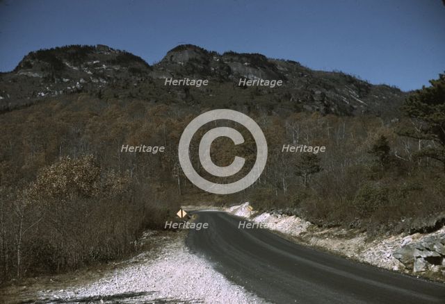 The road along the Skyline Drive, with a light snowfall in the rocks beside, Virginia, ca. 1940. Creator: Jack Delano.