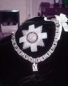 The robes and insignia of the Order of the Thistle, 1953. Creator: Arthur Charles Kirby Ware