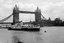 The Royal Eagle paddle steamer with Tower Bridge in the background, London, c1945-c1965 Artist: SW Rawlings