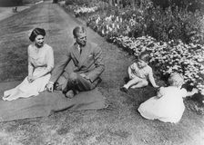 The Royal family in the gardens of Clarence House, London, 1951. Creator: Unknown
