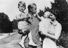 The Royal family in the gardens of Clarence House, London, 1951. Creator: Unknown
