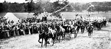 The Royal Review...in Worsley Park:...the arrival of the King and Queen..., 1909. Creator: Topical Press Agency