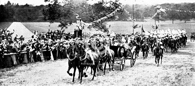 The Royal Review...in Worsley Park:...the arrival of the King and Queen..., 1909. Creator: Topical Press Agency.