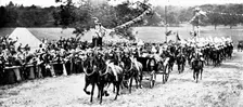 The Royal Review...in Worsley Park:...the arrival of the King and Queen..., 1909. Creator: Topical Press Agency