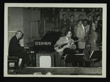The Stan Kenton Orchestra in concert, 1956. Creator: Denis Williams
