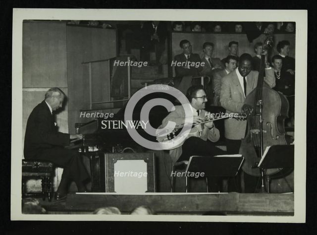 The Stan Kenton Orchestra in concert, 1956. Creator: Denis Williams.
