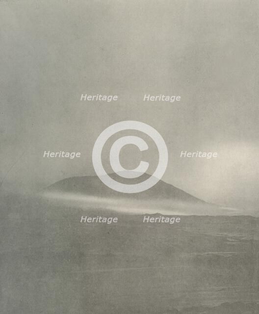 'The Start of a Blizzard...Drift Coming Round Mount Erebus', c1908, (1909). Artist: Unknown.