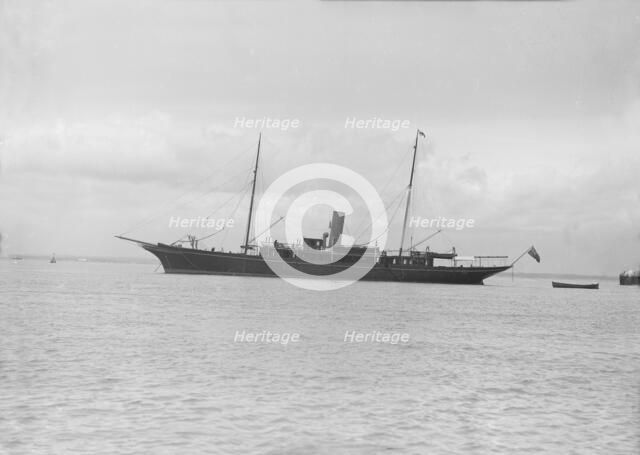 The steam yacht 'Maid of Honour' at anchor. Creator: Kirk & Sons of Cowes.
