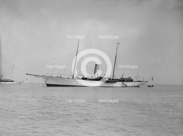 The steam yacht 'Agatha' at anchor, 1911. Creator: Kirk & Sons of Cowes.
