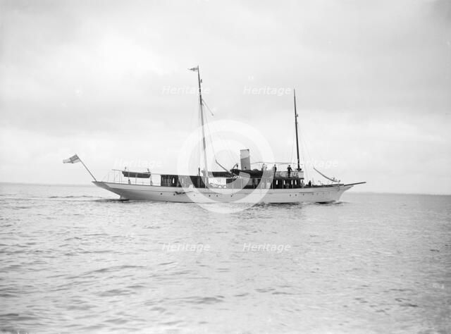 The steam yacht 'Cecilia' under way, 1912. Creator: Kirk & Sons of Cowes.