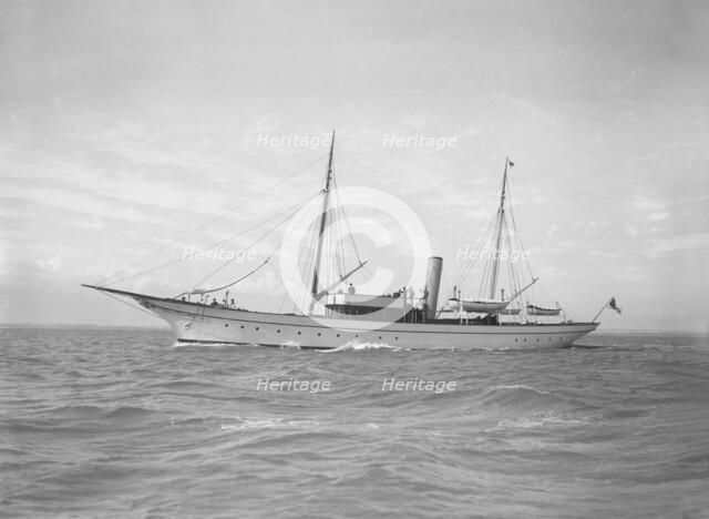 The steam yacht 'Christine' under way, 1911. Creator: Kirk & Sons of Cowes.
