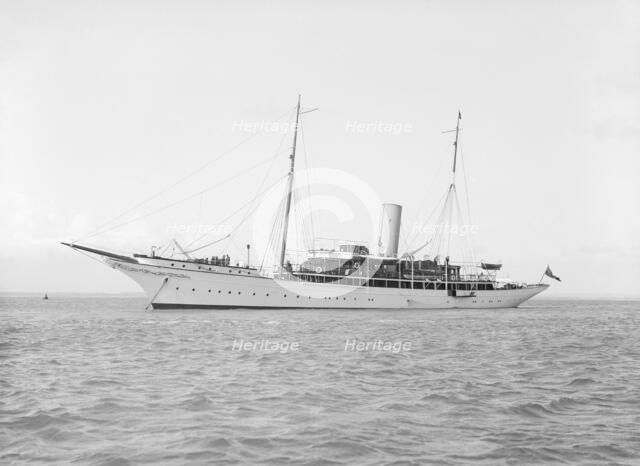 The steam yacht 'Eileen' at anchor, 1914. Creator: Kirk & Sons of Cowes.