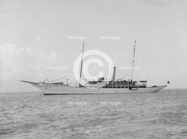 The steam yacht 'Eileen' at anchor, 1914. Creator: Kirk & Sons of Cowes.