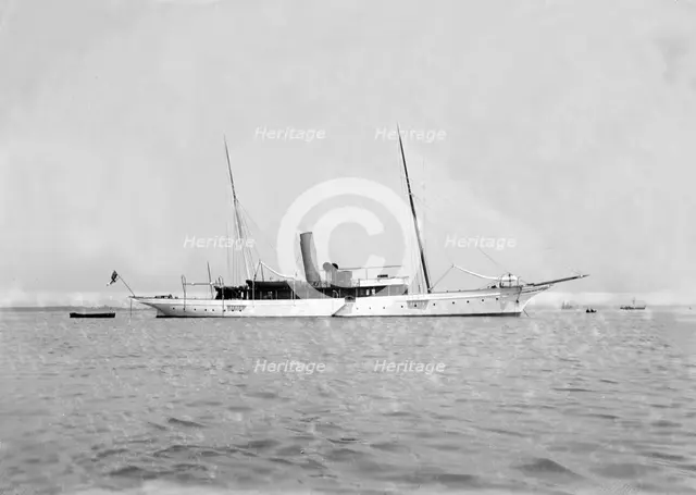 The steam yacht 'Grainaig' at anchor. Creator: Kirk & Sons of Cowes.