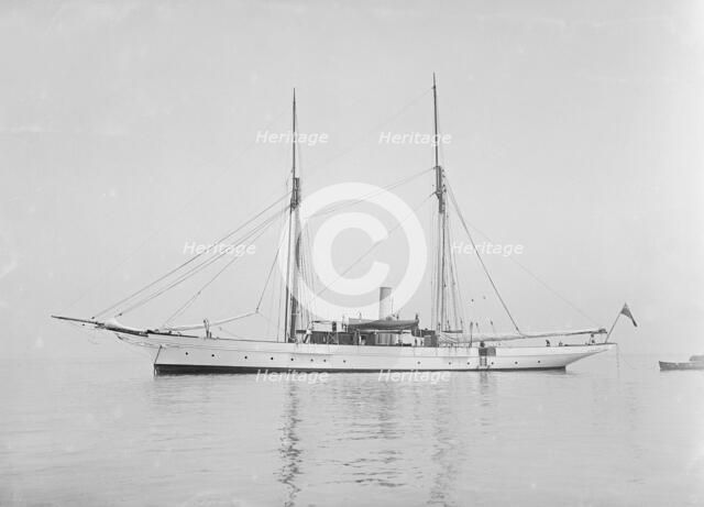 The steam yacht 'Priscilla' at anchor, 1911. Creator: Kirk & Sons of Cowes.