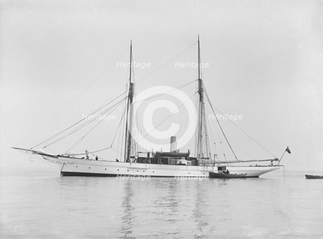 The steam yacht 'Priscilla' at anchor, 1911. Creator: Kirk & Sons of Cowes.