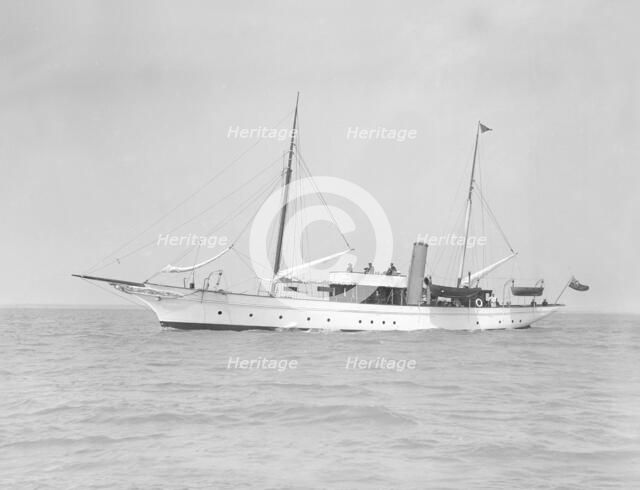 The steam yacht 'Titania' under way, 1911. Creator: Kirk & Sons of Cowes.