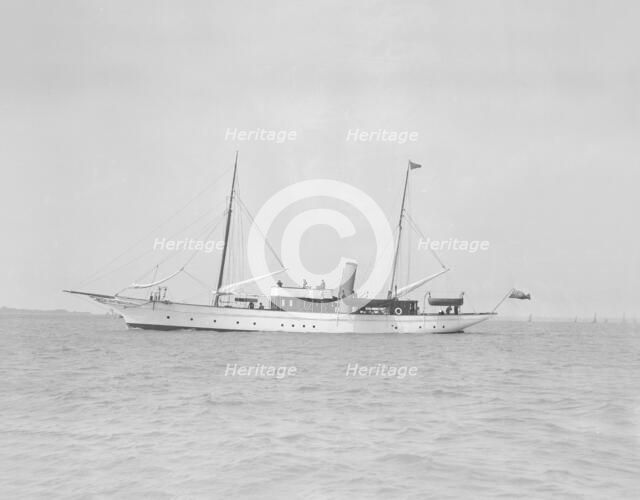 The steam yacht 'Titania' under way, 1911. Creator: Kirk & Sons of Cowes.