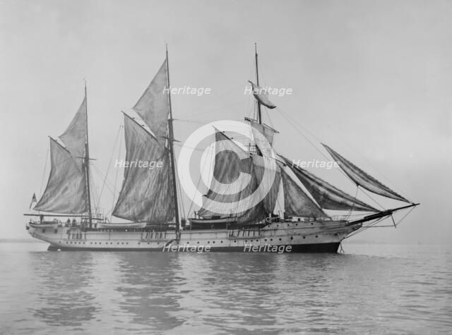 The steam yacht 'Wanderer' (later named 'Vagus') hoisting sails. Creator: Kirk & Sons of Cowes.