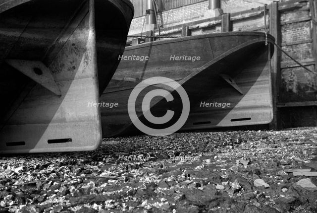 The stern boards of Thames barges, 1937. Artist: SW Rawlings