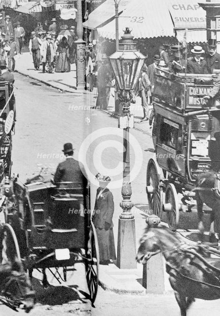 The Strand with Charing Cross Station to the right, Westminster, London, c1900. Creator: Unknown.