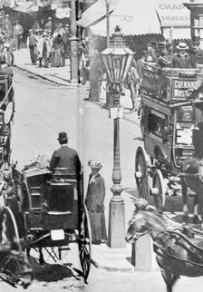 The Strand with Charing Cross Station to the right, Westminster, London, c1900. Creator: Unknown